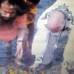 Patrick McCollum and H. H. Puja Swami Saraswati set an example on how to restore the beauty of the sacred Ganges River by personally mucking trash.