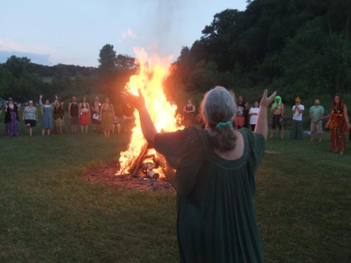 Selena Fox of Circle Sanctuary leading a Lammas bonfire ritual.