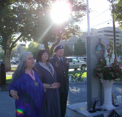 2006 Pagan religious freedom rally at the September 11 memorial in Reno, Nevada. Pictured, left to right: Selena Fox, executive director of Lady Liberty League; Roberta Stewart, widow of Sgt. Patrick Stewart, first Wiccan killed in action in War on Terrorism in Afghanistan; and US Army Chaplain William Chrystal, Pastor Emeritus of First Congregational Church (UCC) of Reno, Nevada.