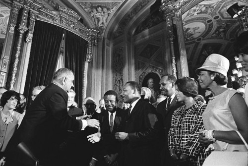 Johnson and Civil rights leaders for Voter's Rights Act.
