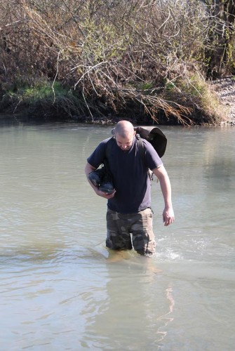 My fellow adventurer crossing the river behind me.