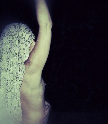 Dancer pauses at a Pagan festival, photo credit Cara Schulz