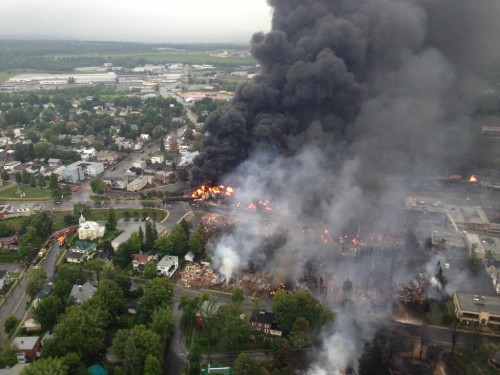 "Lac megantic burning" by Sûreté du Québec - https://twitter.com/sureteduquebec/status/353519189769732096/photo/1. Licensed under CC BY-SA 1.0 via Wikimedia Commons - http://commons.wikimedia.org/wiki/File:Lac_megantic_burning.jpg#mediaviewer/File:Lac_megantic_burning.jpg