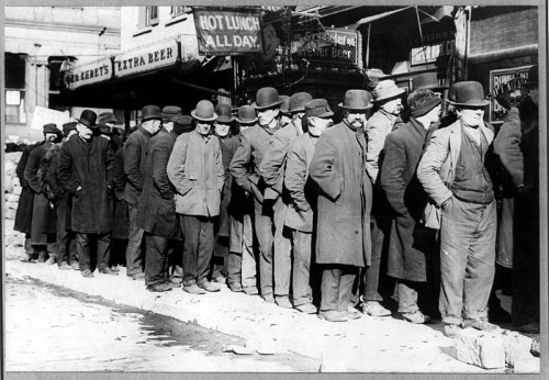 Bread line in New York City, circa 1910. [Public Domain]