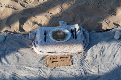 A beggar's display in Santa Barbara, CA. Photo by Dori.