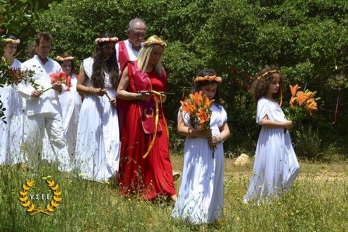 Two young girls lead the procession to the altar. [photo provided by YSEE]