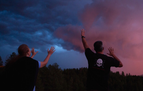 Katherine Stewart and Grant Smith try to ward off storm clouds. Photograph courtesy Lauren Pond.