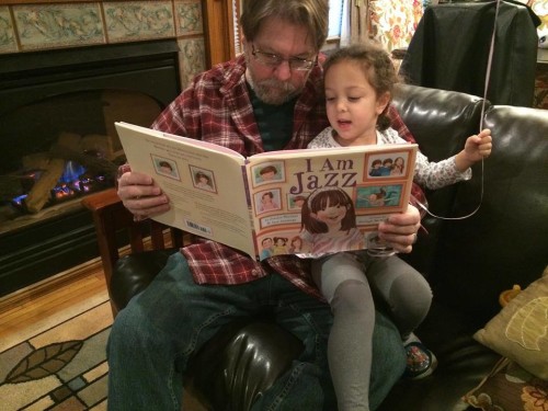 Author Alex Bledsoe reading "I am Jazz" to his daughter [Courtesy Photo]