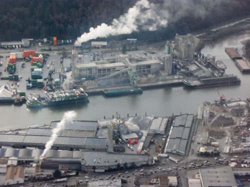 Aerial_view_of_barges_and_warehouses_on_Duwamish_Waterway