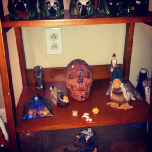 The primordial level of the author's home altar, featuring a clay skull from the Voodoo Spiritual Temple. [Photo by author.]