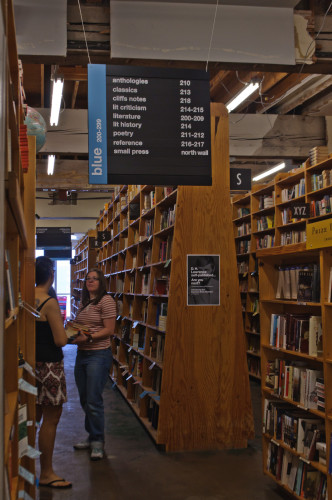 The aisles at Powells. Photo by InSapphoWeTrust