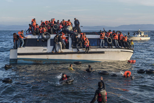 Iraqi and Syrian migrants land on the island of Lesvos. Photo by Ggia.