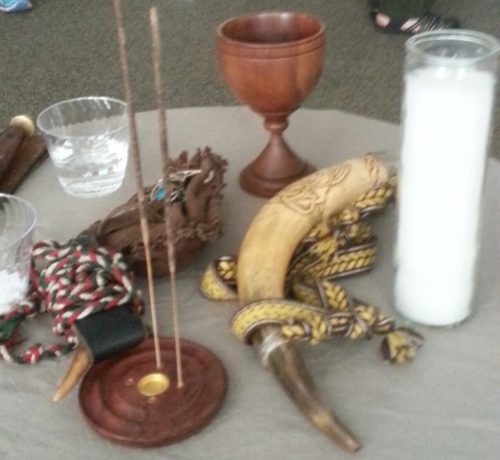 Wooden chalice donated by Janet Farrar and Gavin Bone, pictured on altar [provided]