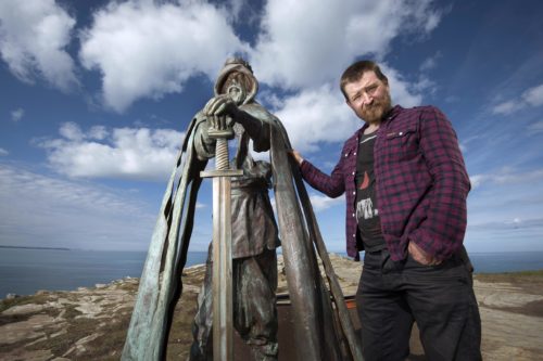 Photograph by Emily Whitfield-Wicks Tintagel Castle - Installation of King Arthur Sculpture. The Sculptor Rubin Eynon from South Wales, just after the sculpture has been landed.