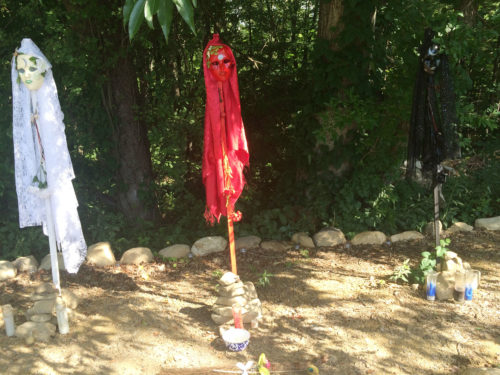 Masks of Hecate guard the Crossroads at the entry. Photo Credit: Tim Titus