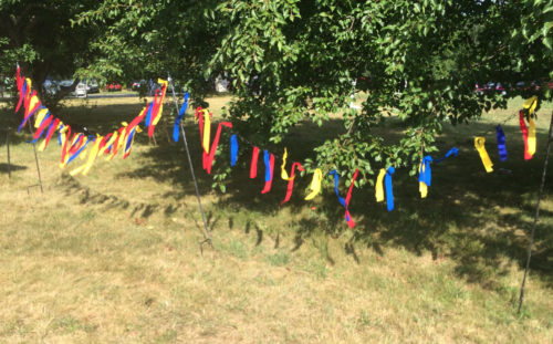Prayer flags were available to the community. Photo Credit: Tim Titus