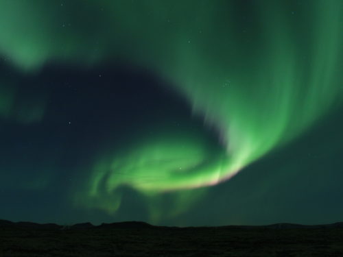 A strong Aurora display over an Icelandic lava-field [Photo Credit: L. Perabo]