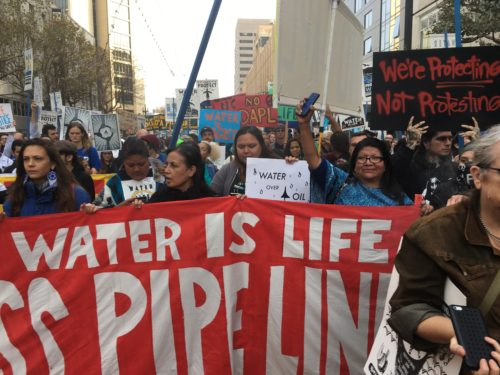 Indigenous leaders from Tohono O'odham nation and other tribes leading the march.