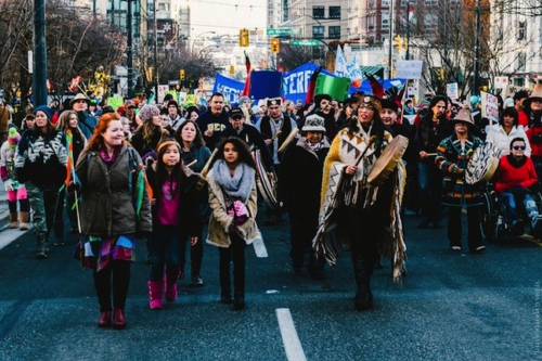 Sparrow (front row, left) leading march as a peace bearer (courtesy photo)
