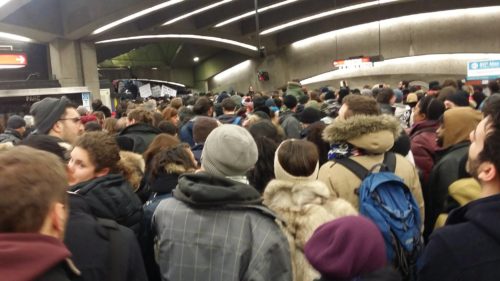 Mourners crowd the metro station in Montreal on their way to a vigil (photo by JD"Hobbes" hickey) 