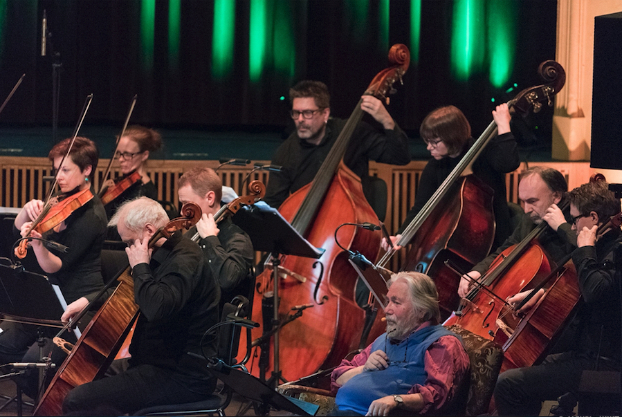 Tor Åge Bringsværd on stage with the North-Norwegian Symphony Orchestra [Photo Credit: Linnea Nordström, 2017]