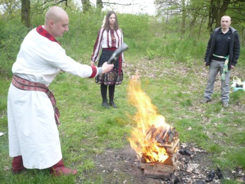 Rodzimowiercy performing ritual [provided].