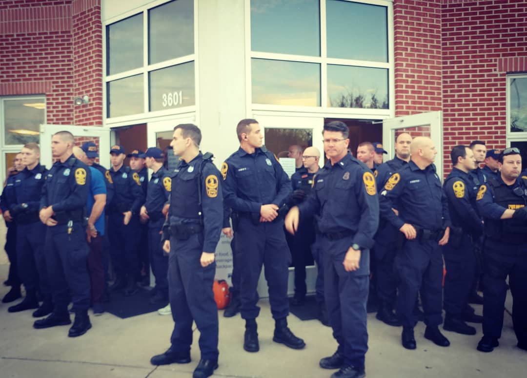 police in front of trinity center