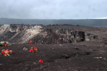 People make offerings to Tutu Pelé as the lava flows